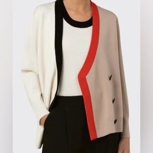 AKRIS  Punto Asymmetrical Colour Blick Cardigan with Black Neckline and Red Trim